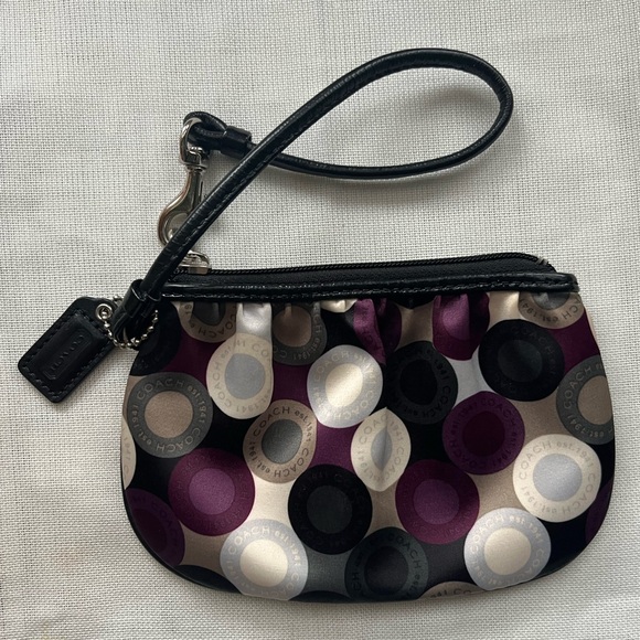 Coach Handbags - Coach Circle Pattern Wristlet in Black and Purple